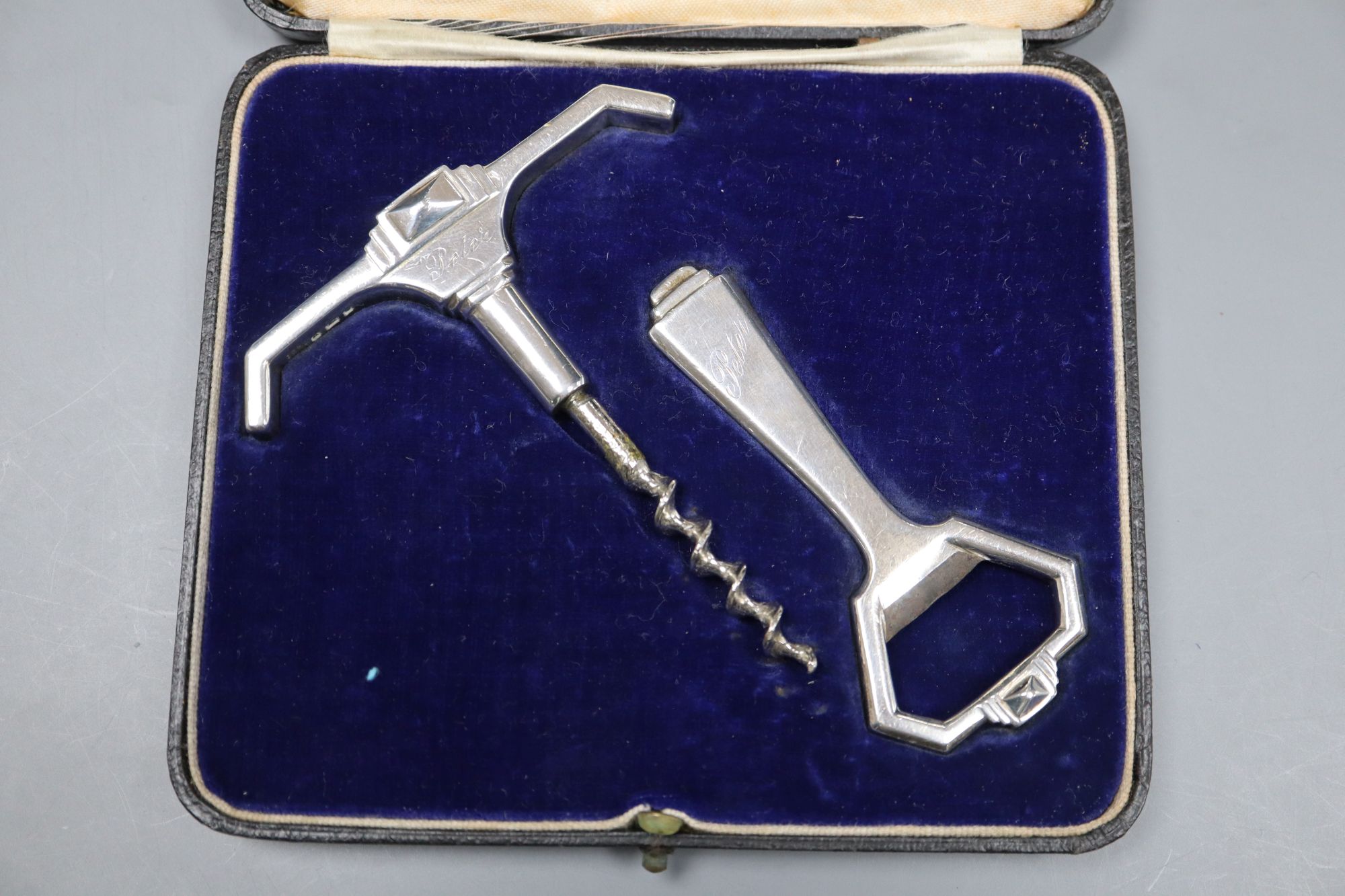 A cased Art Deco silver mounted corkscrew and bottle opener, Page, Keen & Page, London, 1936, corkscrew 95mm,